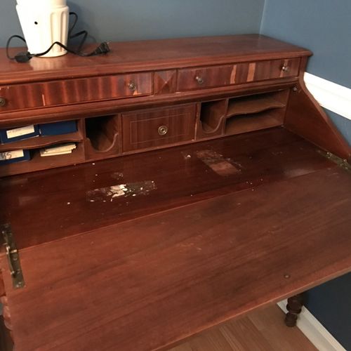 My grandmother's desk had a damaged leg, missing v