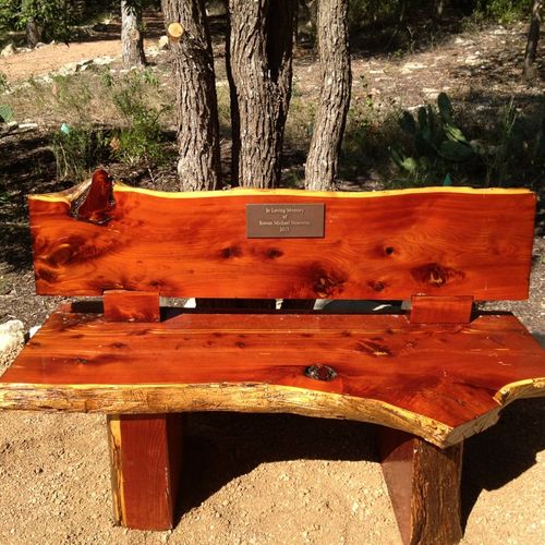 Nick built a custom bench from a  cedar tree log f