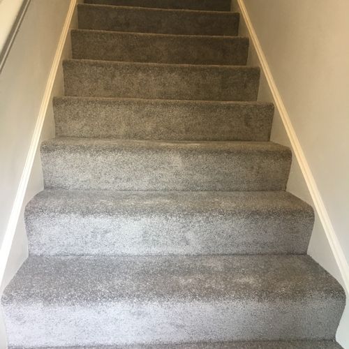 Installed carpeting on 2 sets of stairs and hallwa