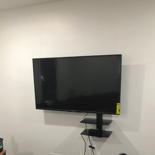 Tv mounting with shelves. Arrived on time. Job don
