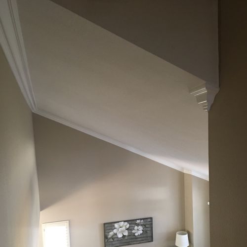 Clay installed crown molding in our family room an