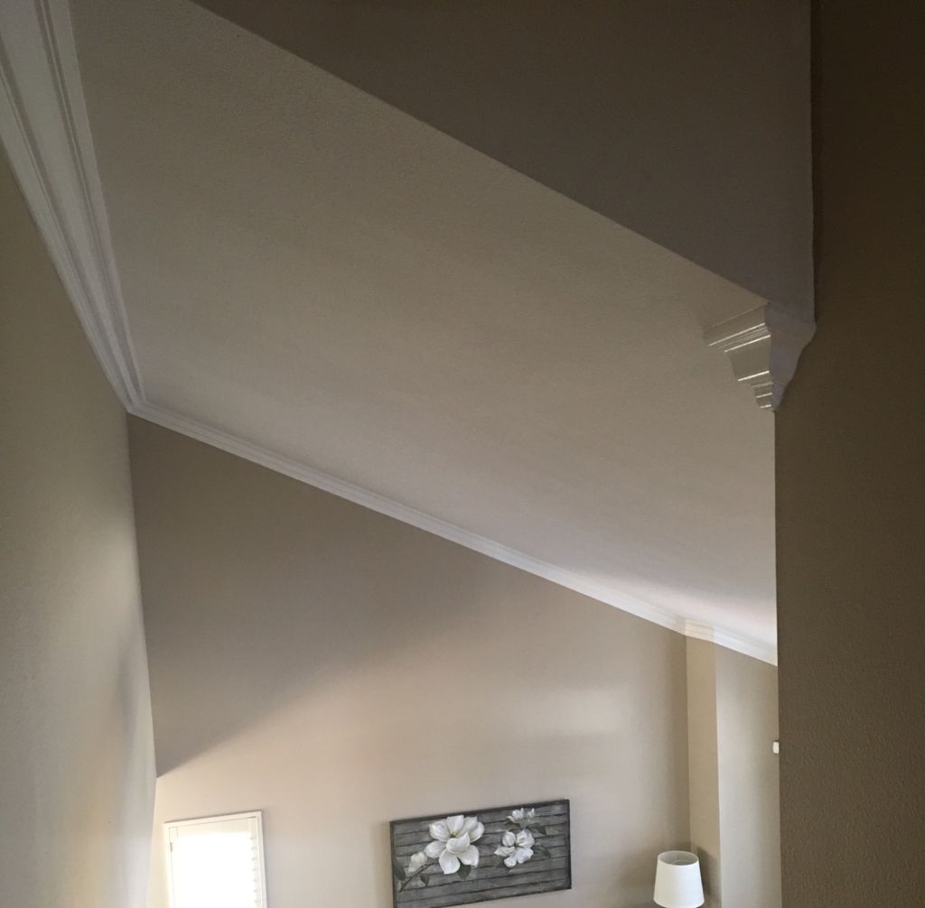 Clay installed crown molding in our family room an