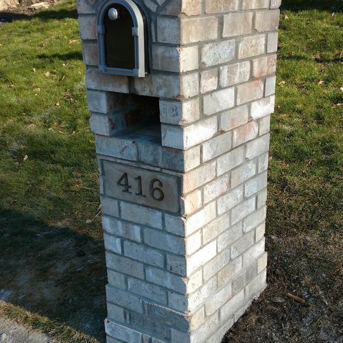 Built new brick mailbox to replace one destroyed b