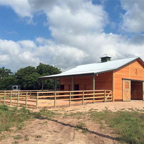 He built a custom barn and corral for my roping ho