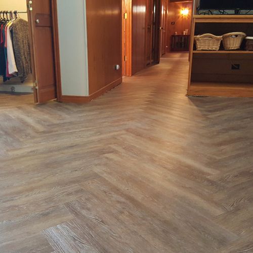 Installed flooring in 7 rooms with vinyl plank and