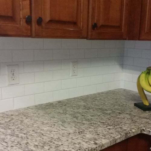 We had Daryl put subway tile in the kitchen over o