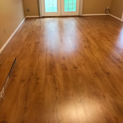 They installed new laminate wood floors. The floor