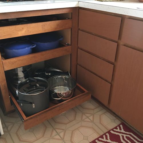 We asked for a cabinet with roll-out trays to be b