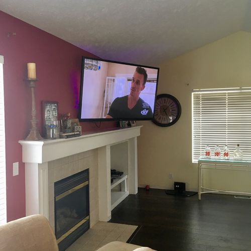 We wanted our 60" tv mounted over the fireplace an