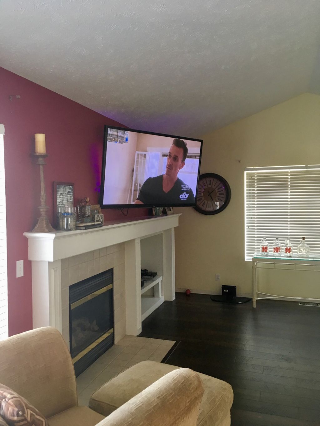 We wanted our 60" tv mounted over the fireplace an