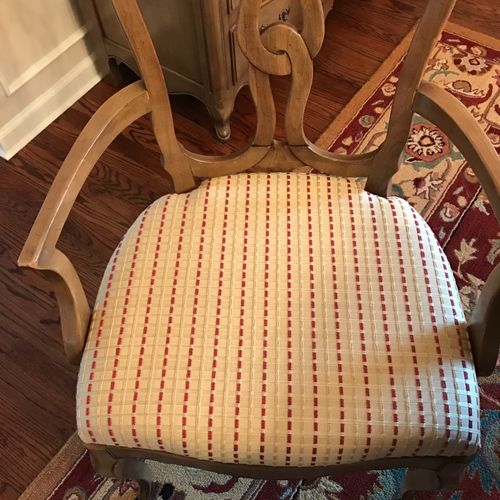 I had Steve recover my dining room chairs with mat