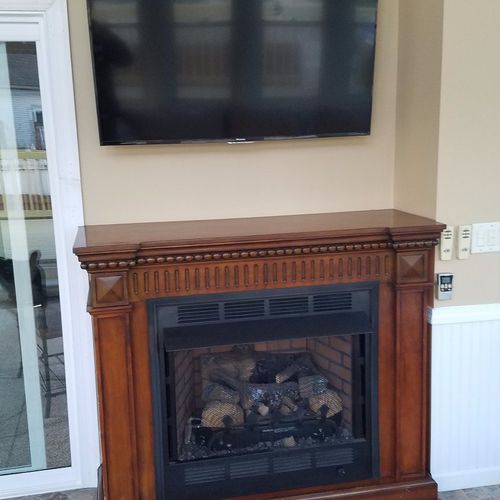 Tony put in a 50 inch wall mount above a fireplace