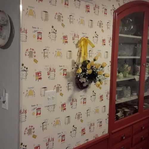 Tanna did a kitchen update.  She wall papered and 