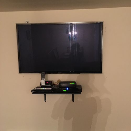 Eddie mounted my tv on the wall and a shelf for ac