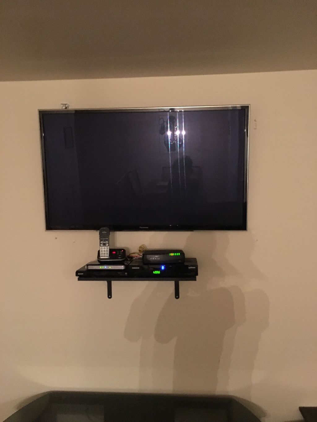 Eddie mounted my tv on the wall and a shelf for ac