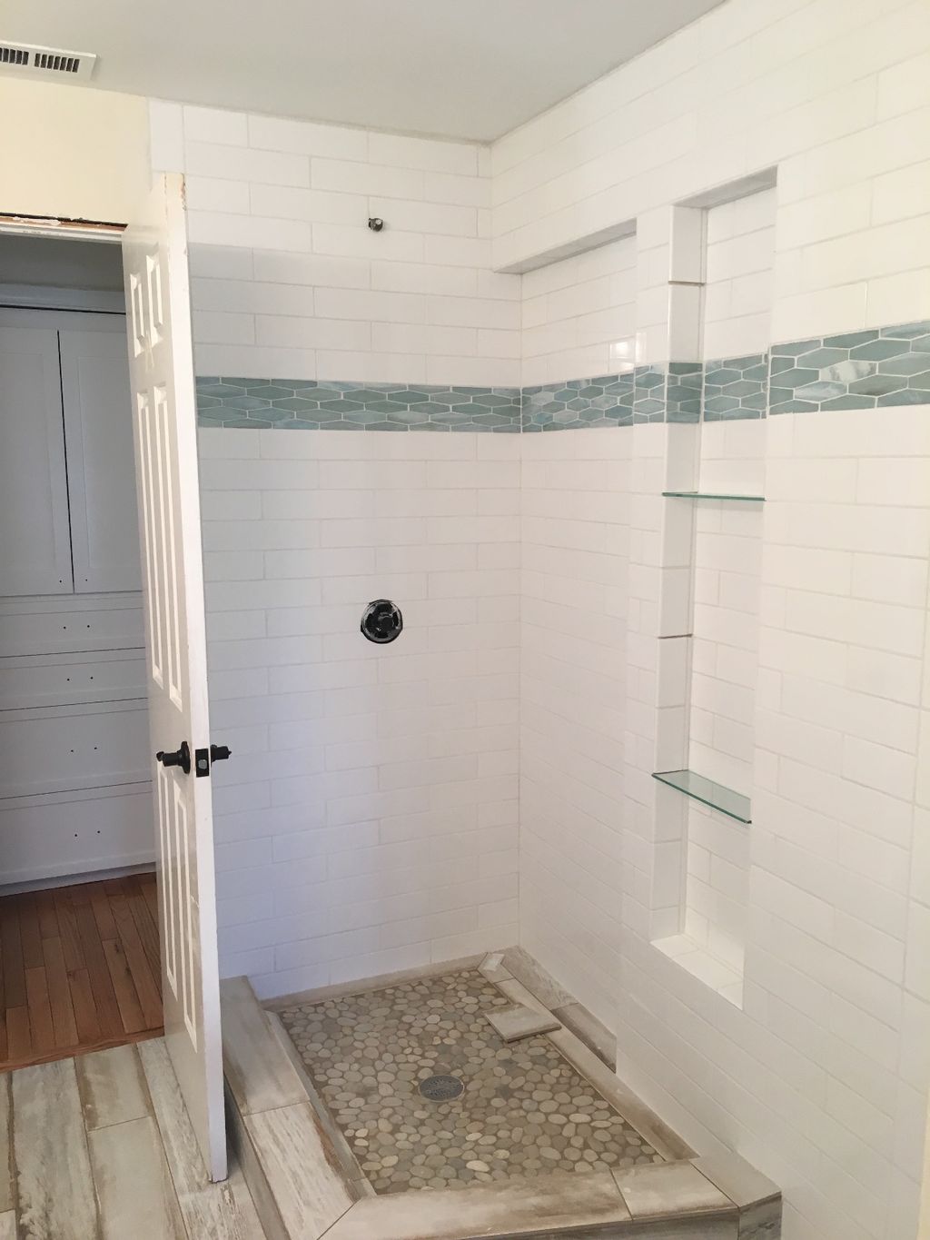 Brian did an amazing job on our bathroom tile! It 