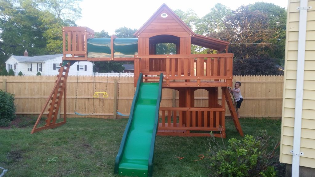 We hired Hugo to build a big swingset/playhouse fo