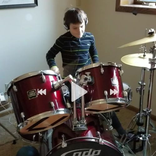 Alec teaches drum for my 8-year-old son, Carlin. C