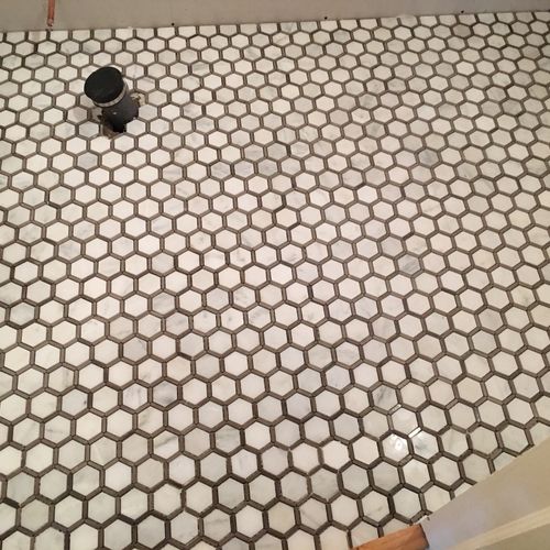 Brian tiled (2) floors and did a great job. He is 