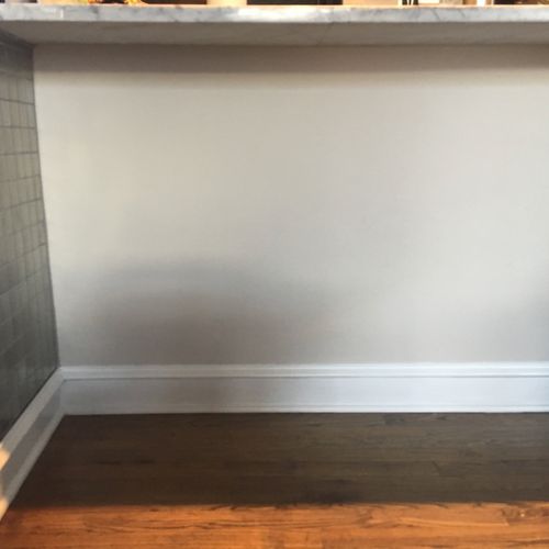 We added trim to our existing baseboards and paint