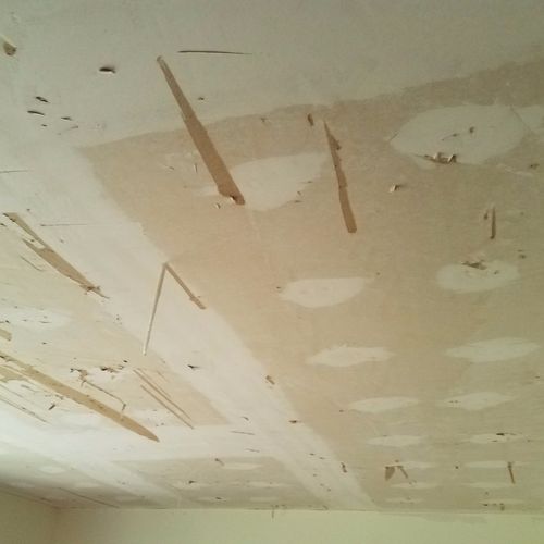 Our new home had awful painted popcorn ceilings th