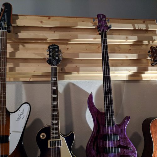 These guys built a guitar rack that hangs over a s