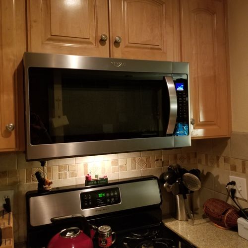Patrick installed our new microwave oven.  He had 