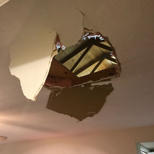 Kevin patched up a large hole in the ceiling. Grea