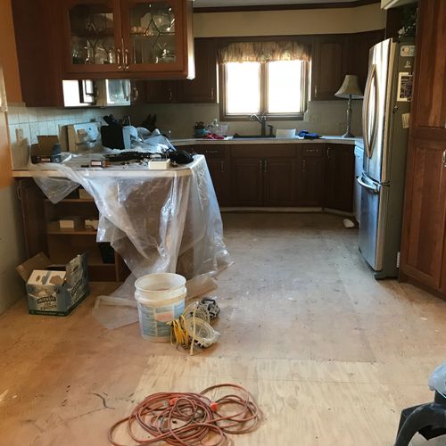 I hired Travis to do a major kitchen/living room r