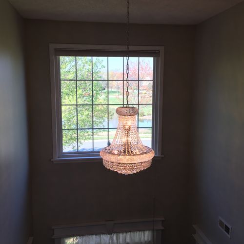 Installed and assembled our chandelier. Arrived on