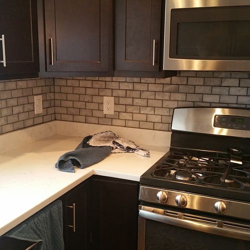 Worked with Julio to install backsplash in my kitc
