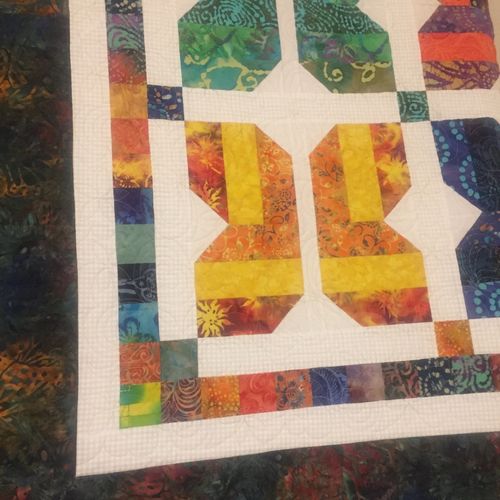 DD has done quite a few quilts for me and I love e