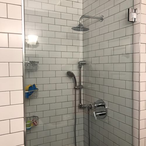 I hire Artistic Lule Inc to install my shower door