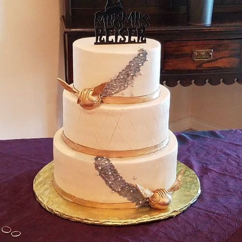 The wedding cake and groom's cake were fabulous! S