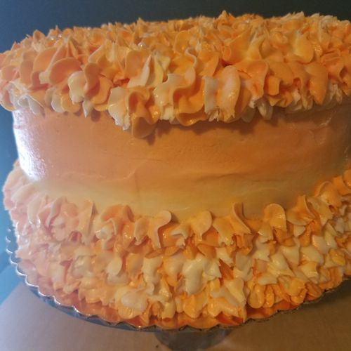 Josette made a triple layer butter cream orange ca