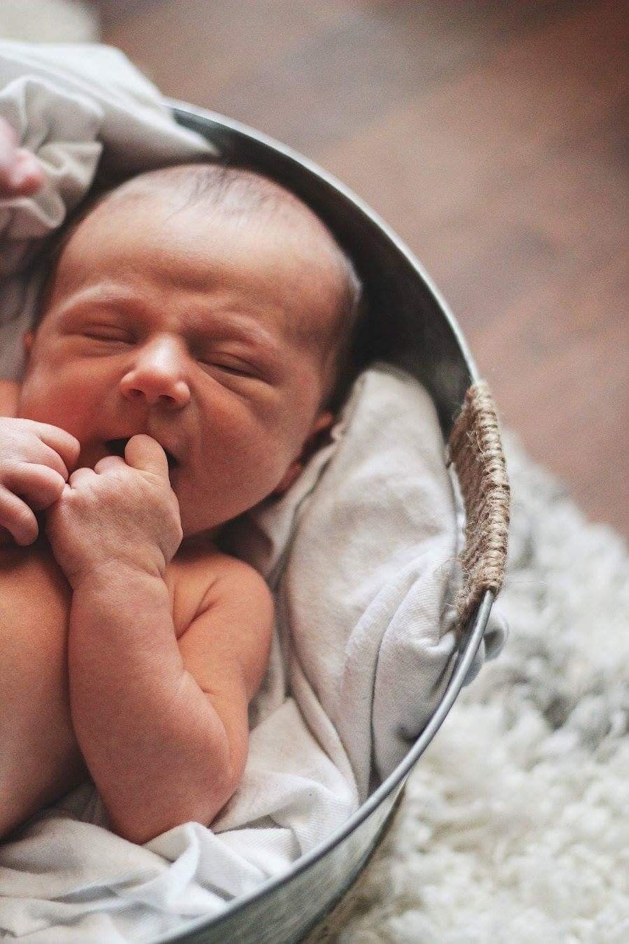 Tracy did a newborn photoshoot with our son and di