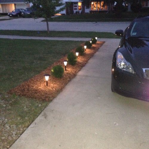 Great work! Put in new bushes and landscape lights