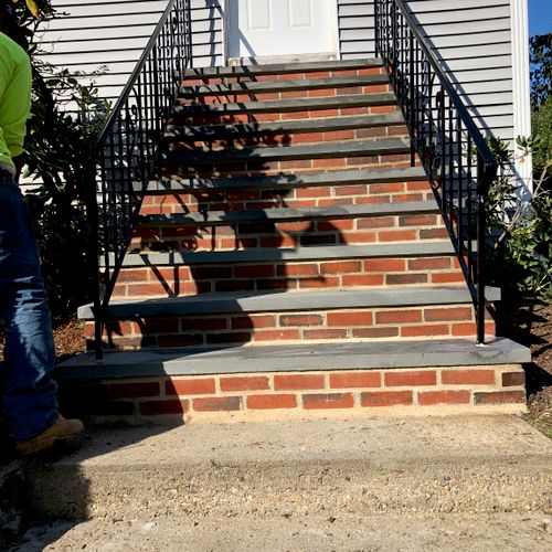 I hired Marcos to fix my front steps. I needed new