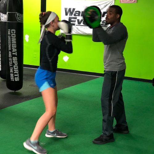 My 12-year-old daughter trains MMA with Coach Dame