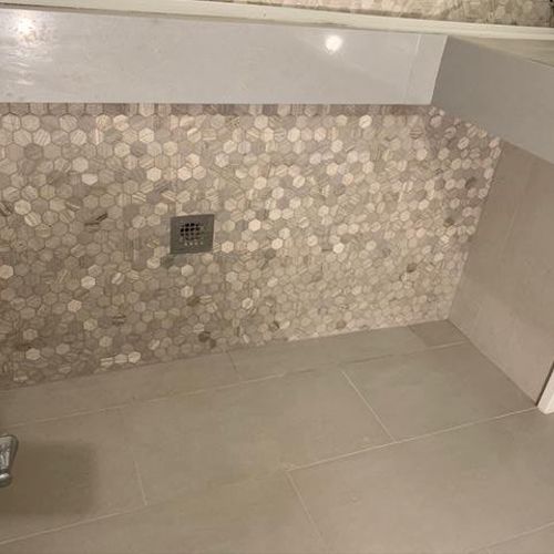 We hired Jason to re-do our shower floor as it was