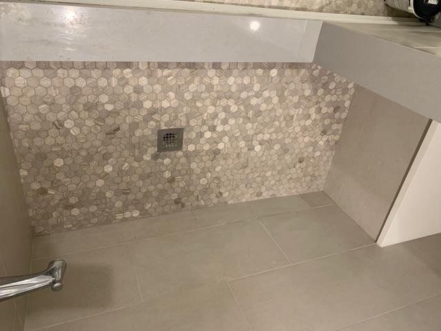 We hired Jason to re-do our shower floor as it was