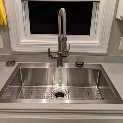 Jonathan installed a sink, faucet, and disposal un