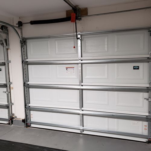 Bill replaced two single garage doors for us and t