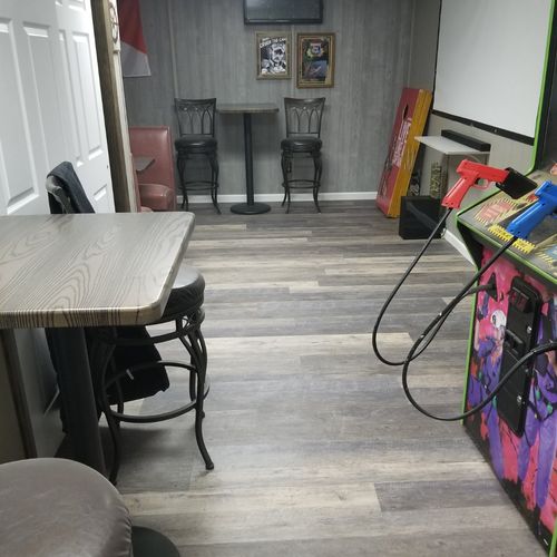 We hired Ron to put flooring down in our game room