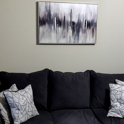 Art Installation Centered Above Couch