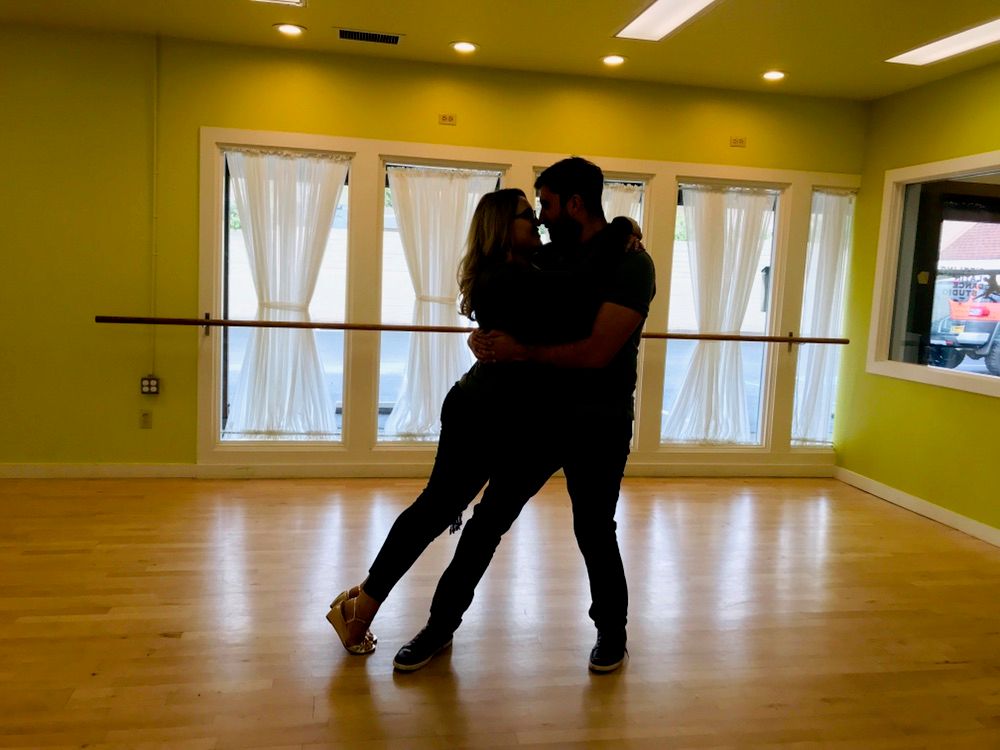 Beautiful wedding couple practicing their first da