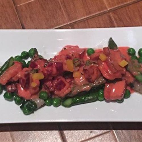 Beet Gnocchi with Spring Vegetables in a Light Cre