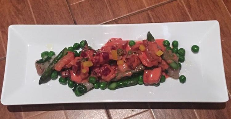 Beet Gnocchi with Spring Vegetables in a Light Cre