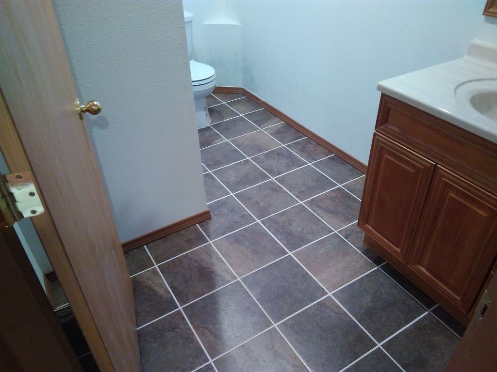 Tile floor and vanity installation