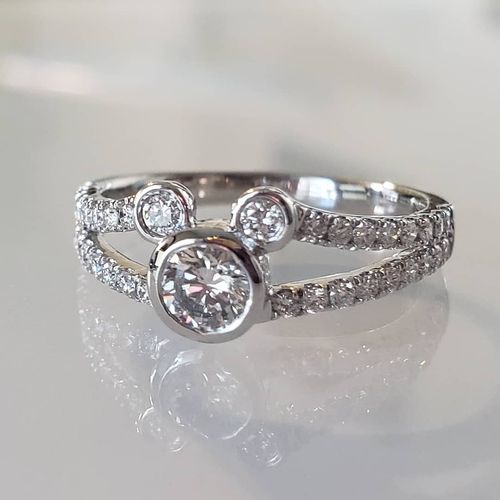 This 14k diamond Mickey-themed engagement ring was
